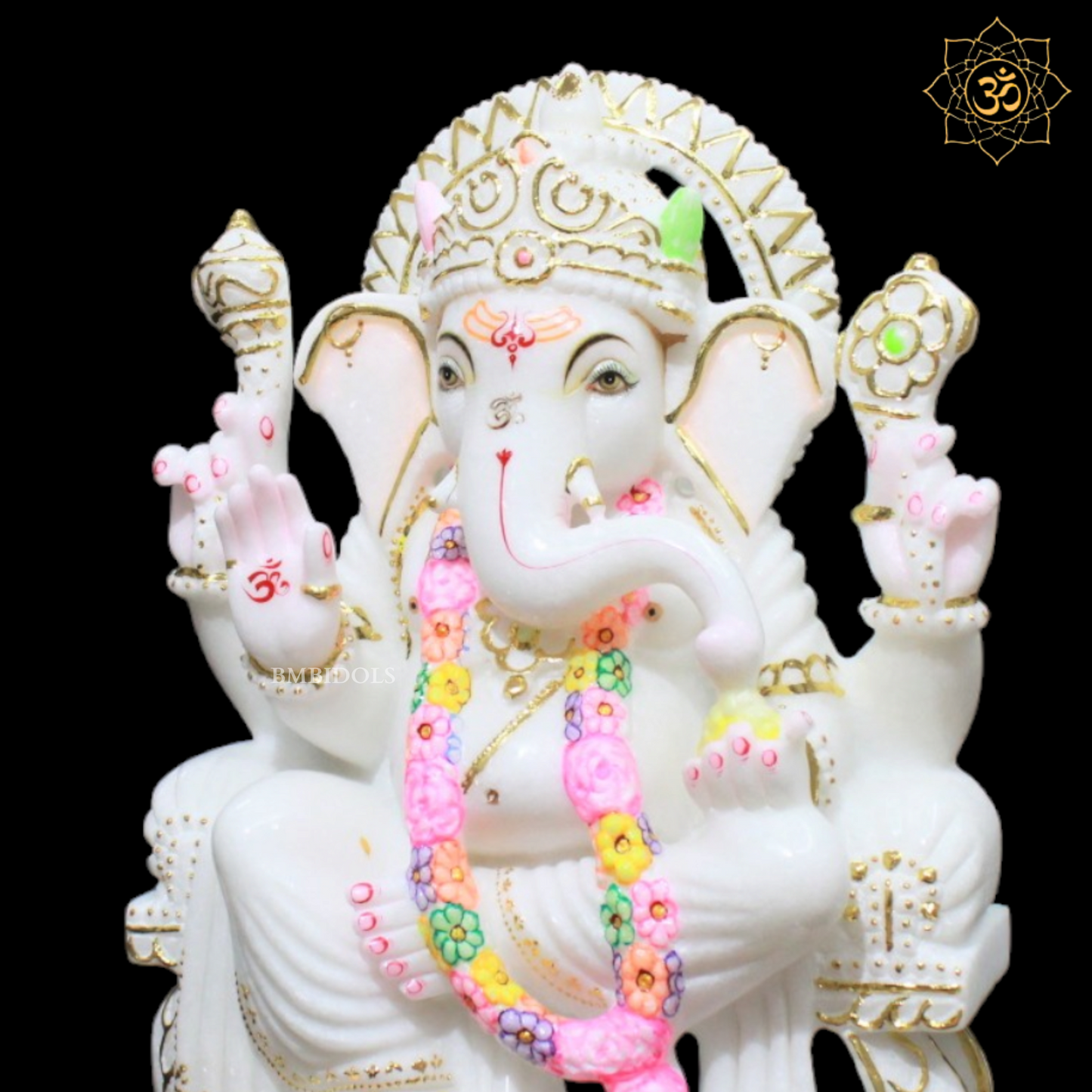 White Marble Ganesha Murti in Gold in Left side Trunk