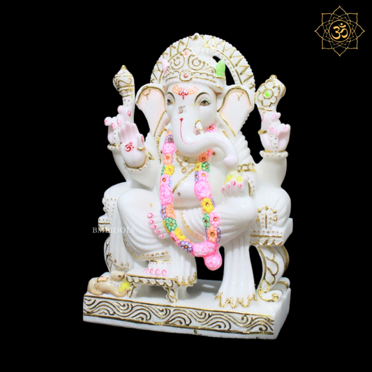 White Marble Ganesha Murti in Gold in Left side Trunk