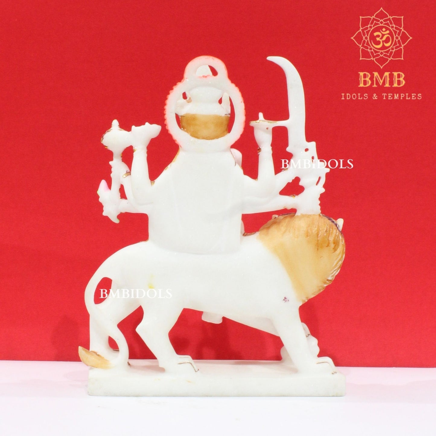 Marble Durga Murti with eight hands sitting on the Lion in Small Size