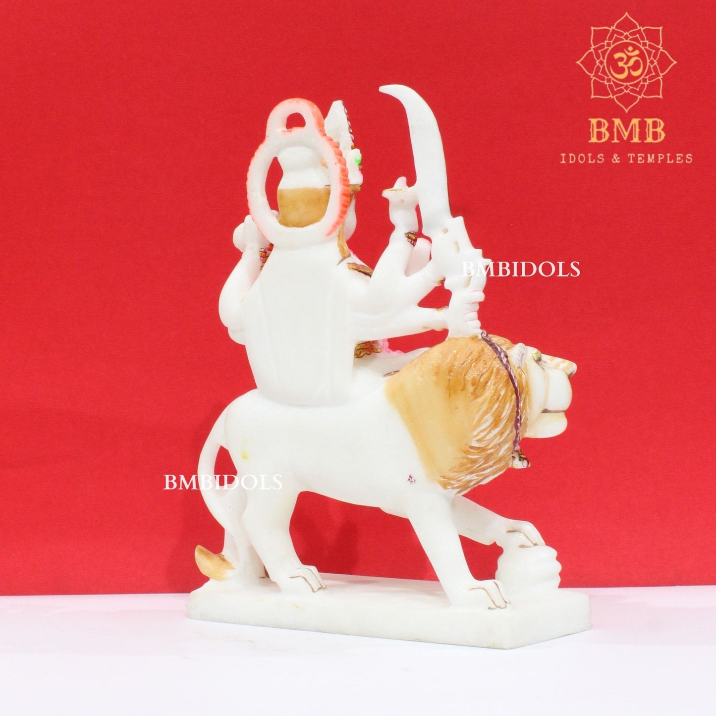 Marble Durga Murti with eight hands sitting on the Lion in Small Size