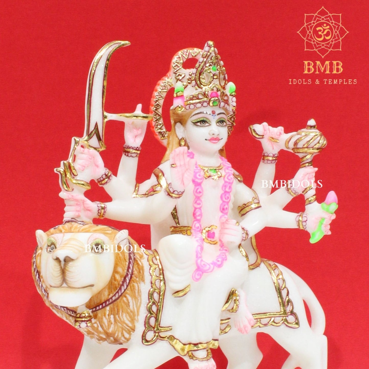 Marble Durga Murti with eight hands sitting on the Lion in Small Size